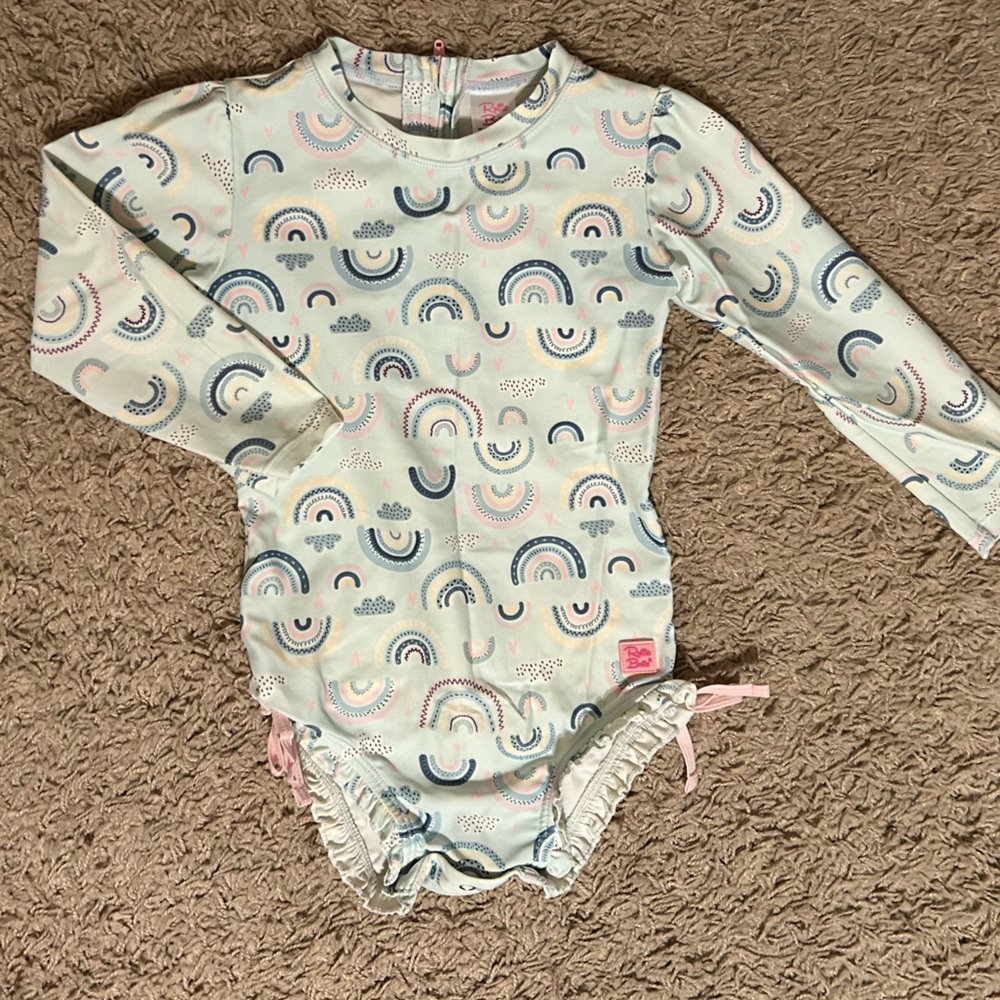 Ruffle Butts Rainbow print one-piece rash guard swimsuit